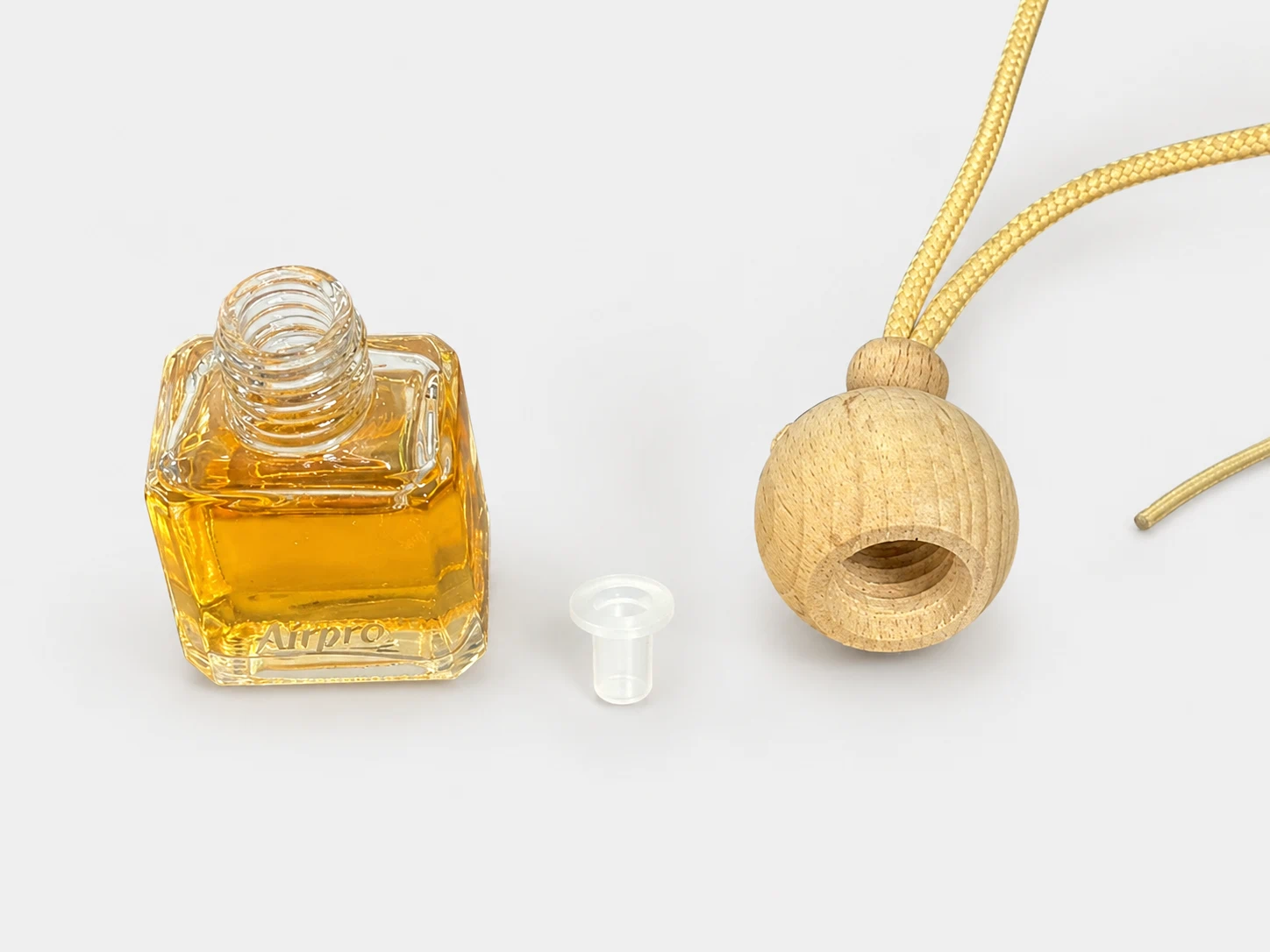 Hanging glass car air freshener bottle with wooden cap and fragrance liquid for leakage control