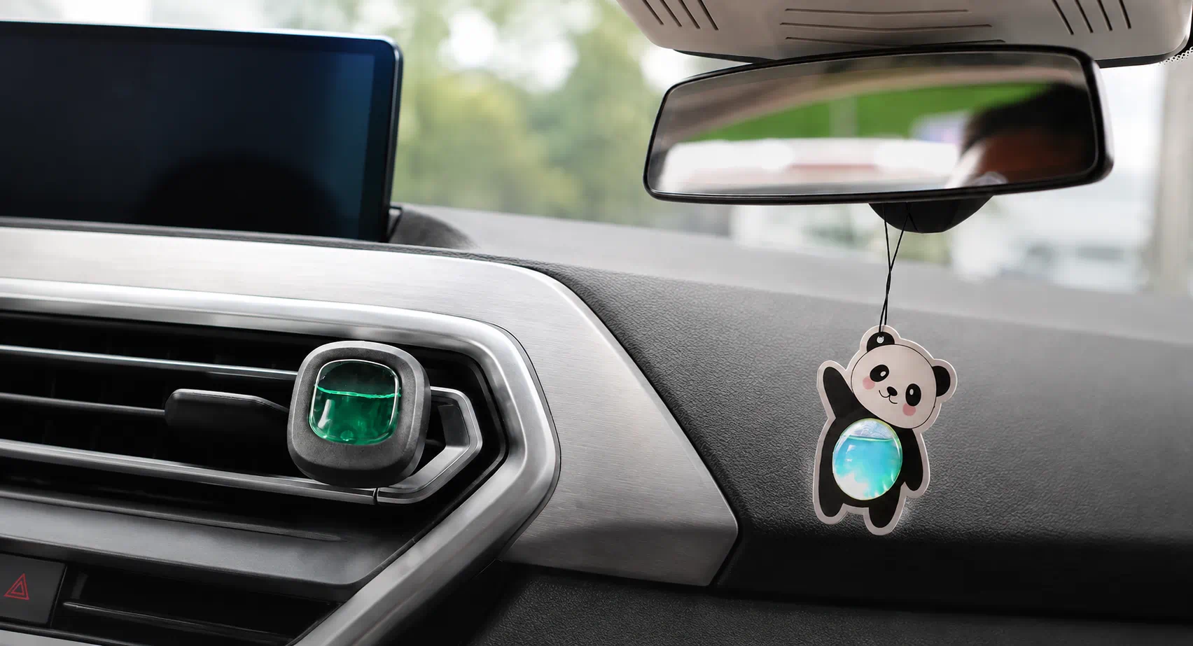 Vent clip and hanging membrane air fresheners installed inside a car