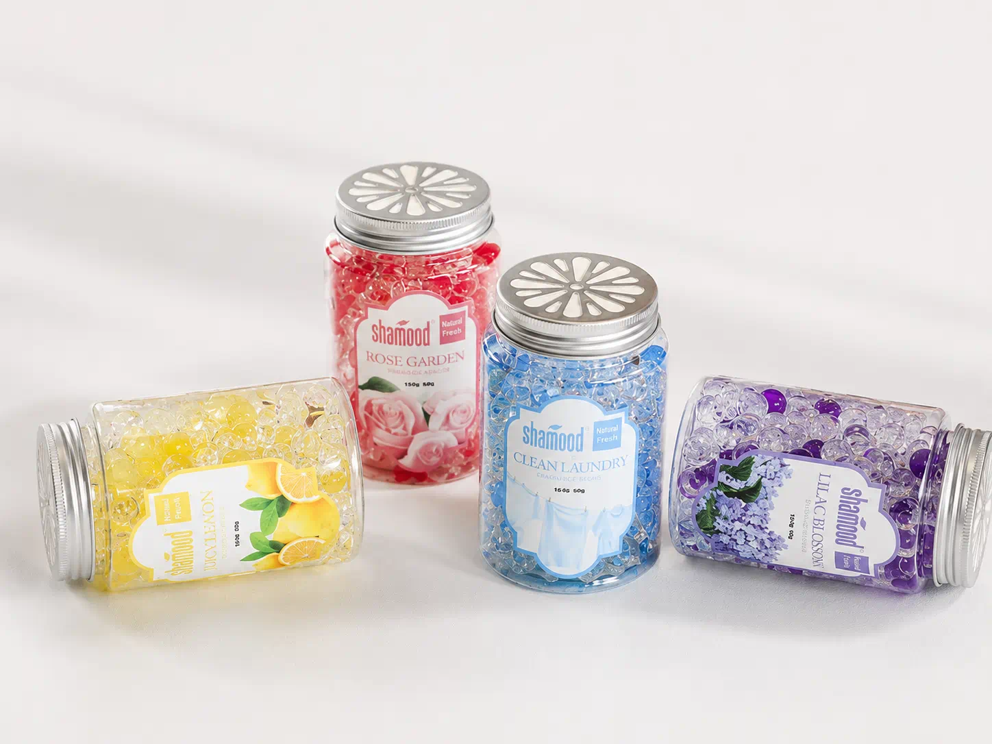 Scent bead air freshener with fragranced beads in transparent container